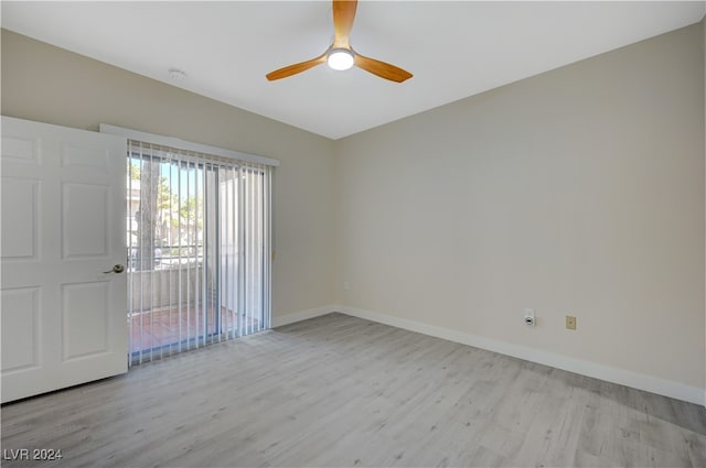 spare room featuring ceiling fan and light hardwood / wood-style floors