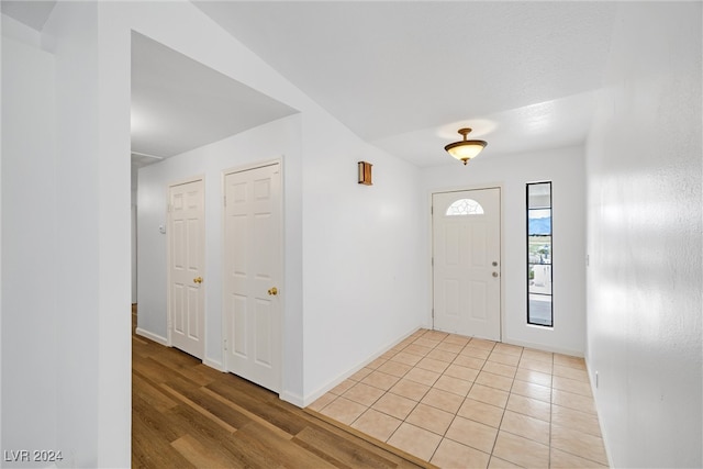 entryway with light hardwood / wood-style flooring