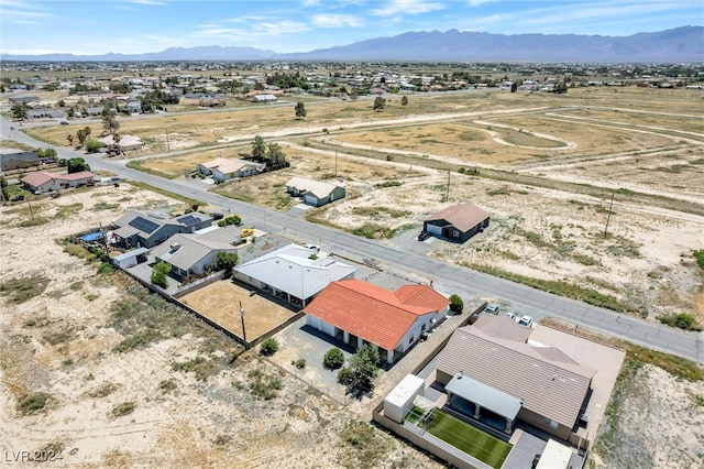 bird's eye view with a mountain view