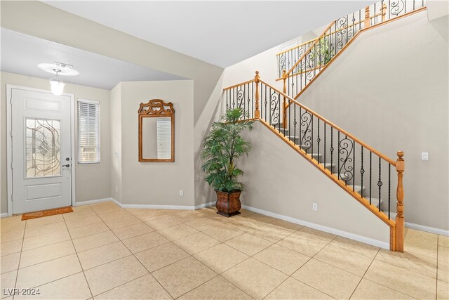 view of tiled foyer entrance