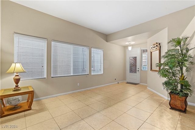 entrance foyer featuring light tile patterned floors