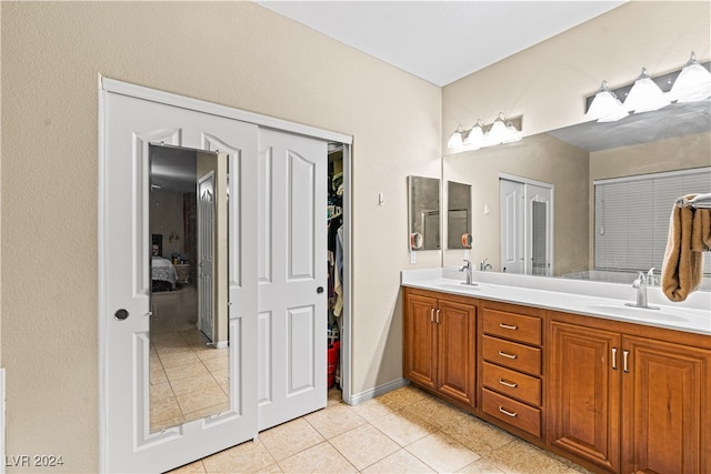 bathroom featuring vanity and tile patterned floors