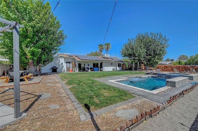 view of swimming pool featuring a yard and a fenced in pool