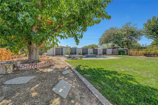 view of yard with a fenced backyard