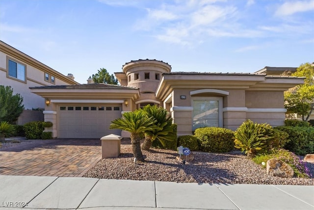 view of front of home with a garage