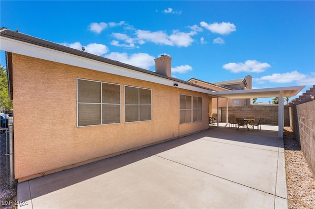 rear view of house with a patio area