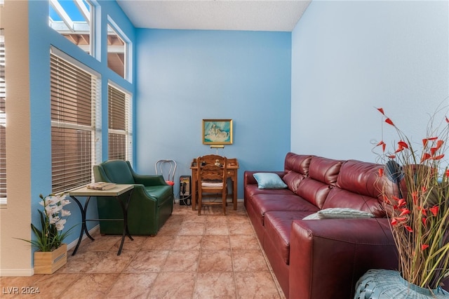 living room with light tile patterned floors