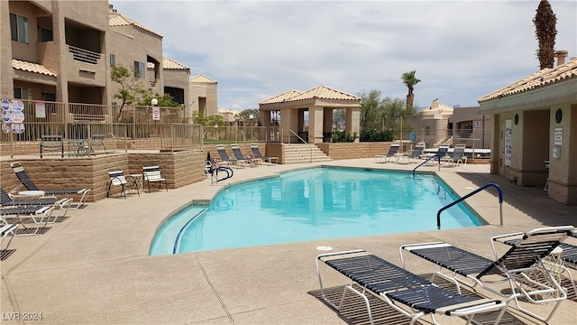 view of pool with a patio and a gazebo