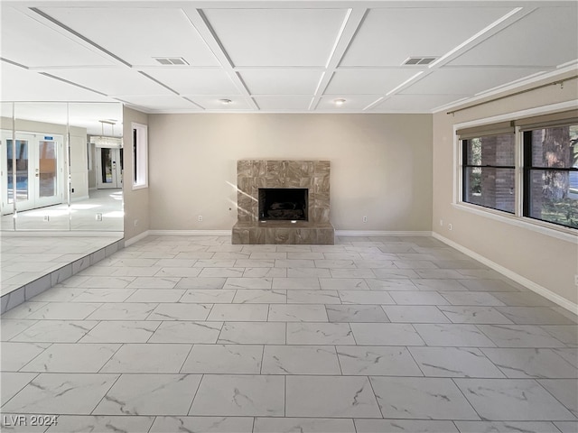 unfurnished living room featuring a fireplace