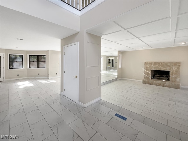 unfurnished living room featuring a fireplace