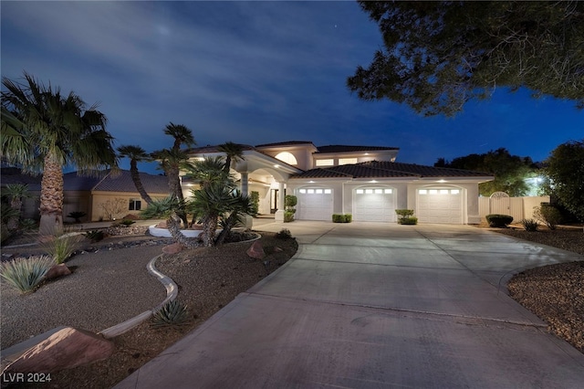 view of front of property featuring a garage