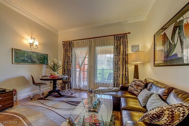 living room featuring ornamental molding and hardwood / wood-style flooring