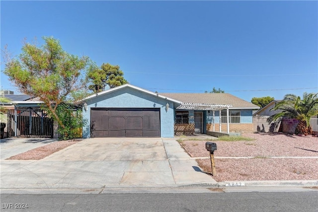 4842 E Imperial Ave, Las Vegas, NV 89104 - single story home with an attached garage, driveway, and stucco siding