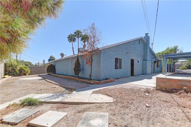 view of home's exterior featuring a patio