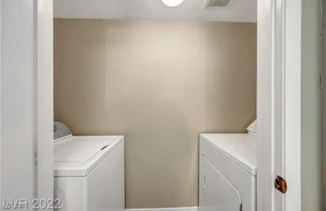 laundry area with washer and dryer