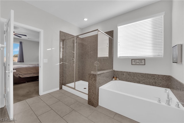 bathroom featuring tile patterned flooring, ceiling fan, and separate shower and tub