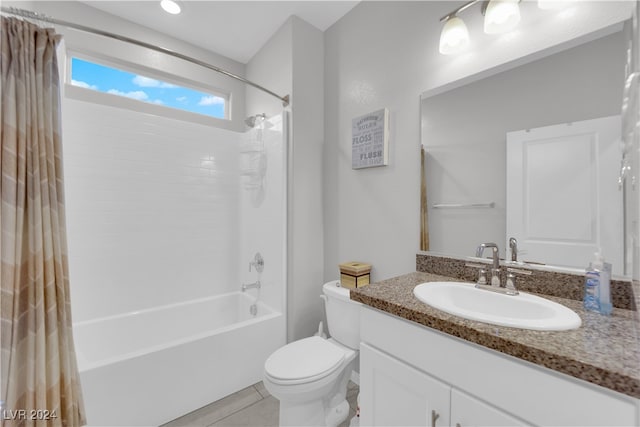 full bathroom featuring vanity, tile patterned flooring, shower / bathtub combination with curtain, and toilet