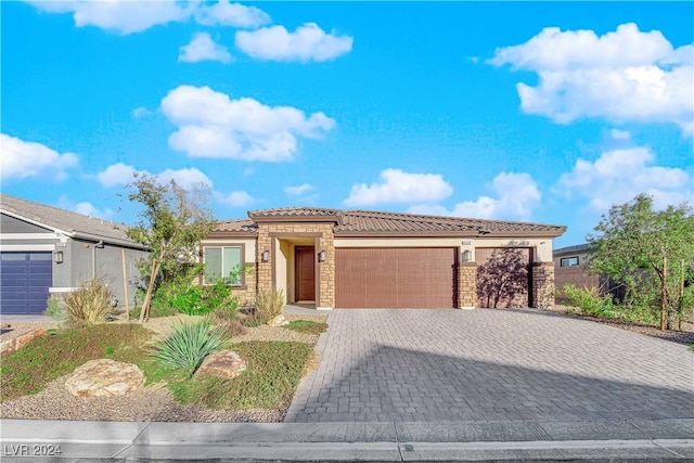 view of front of home featuring a garage