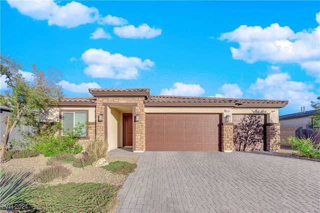 view of front of home featuring a garage