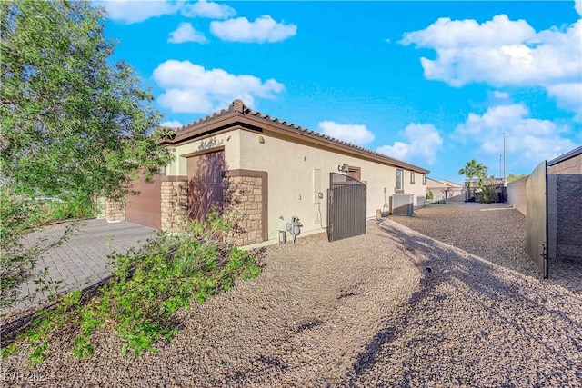 view of home's exterior featuring a garage