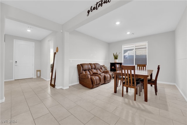 dining room featuring light tile patterned floors and plenty of natural light