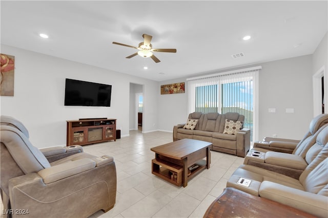 living room with light tile patterned floors and ceiling fan