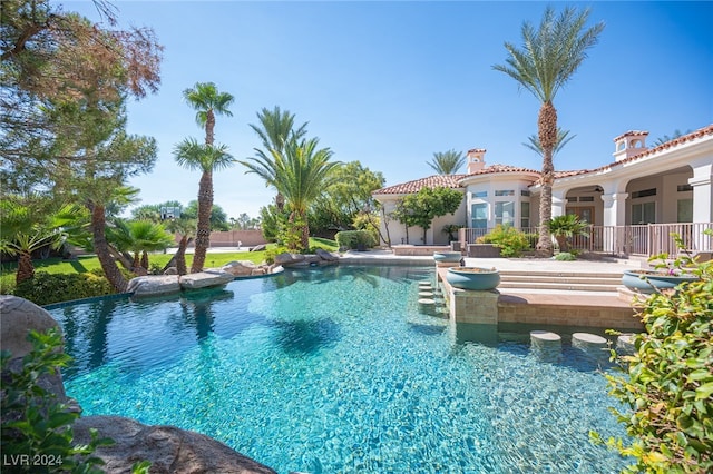 view of swimming pool featuring a patio area