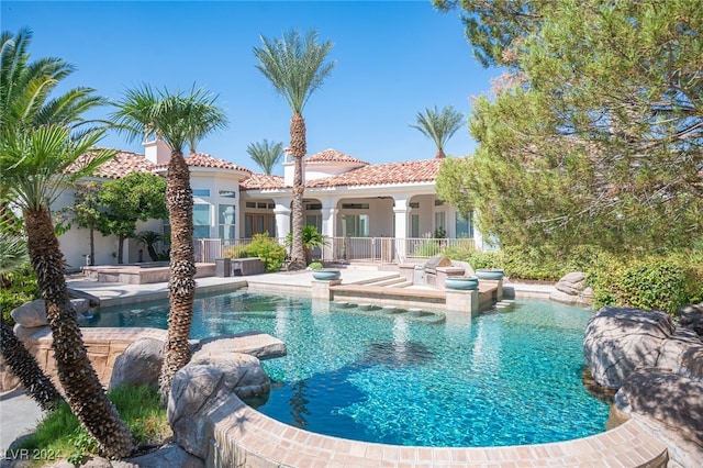 view of swimming pool with a patio