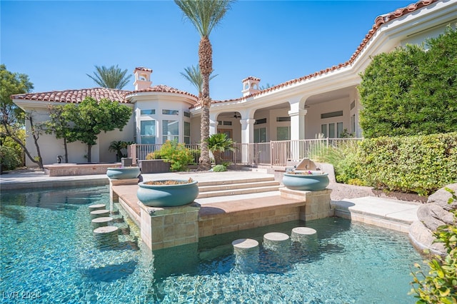 view of swimming pool featuring a patio