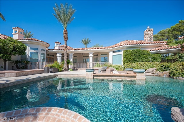 view of pool featuring a patio