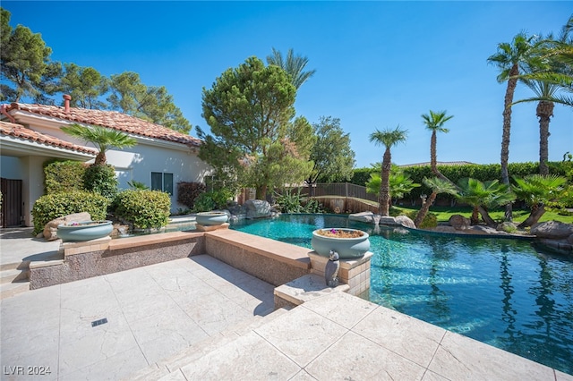 view of swimming pool featuring a patio