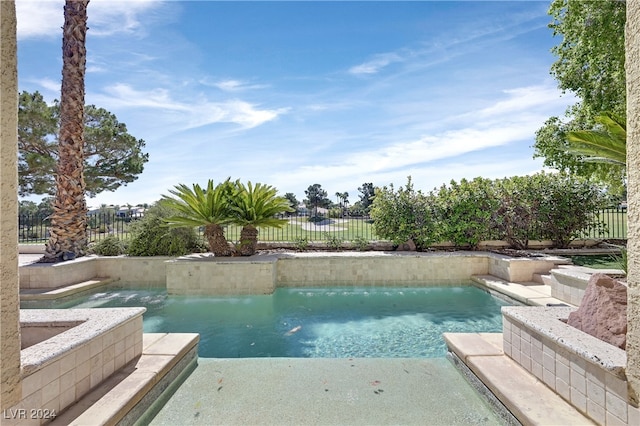 view of swimming pool featuring pool water feature