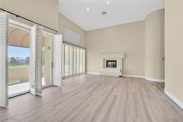 unfurnished living room featuring light hardwood / wood-style flooring