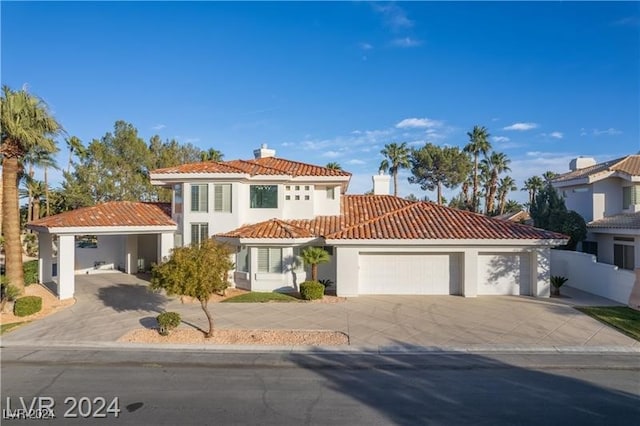 mediterranean / spanish house featuring a garage