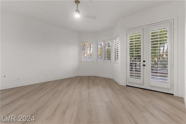 unfurnished room with light hardwood / wood-style flooring