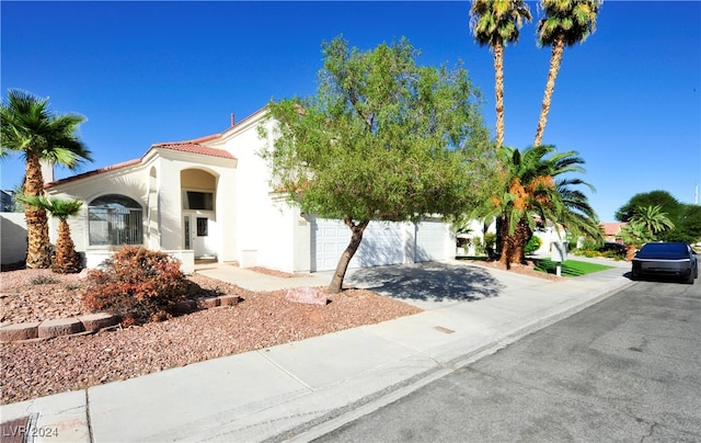 view of front of home with a garage