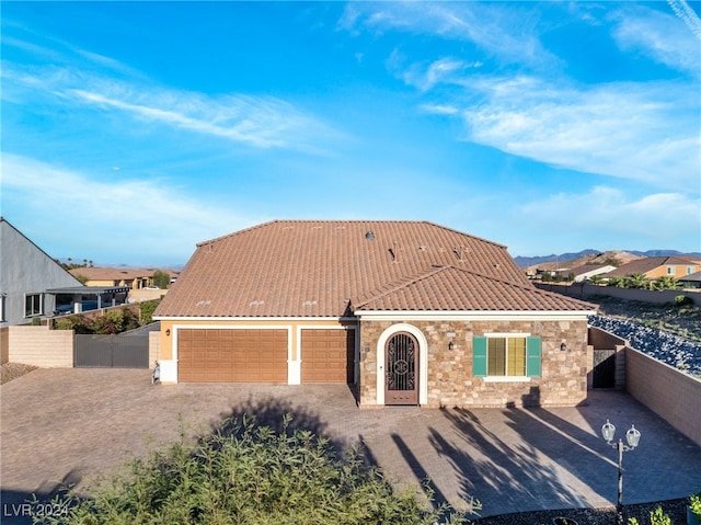 view of front of home with a garage