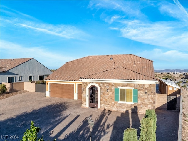 view of front of home featuring a garage