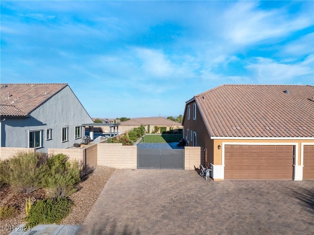 view of property exterior featuring a garage