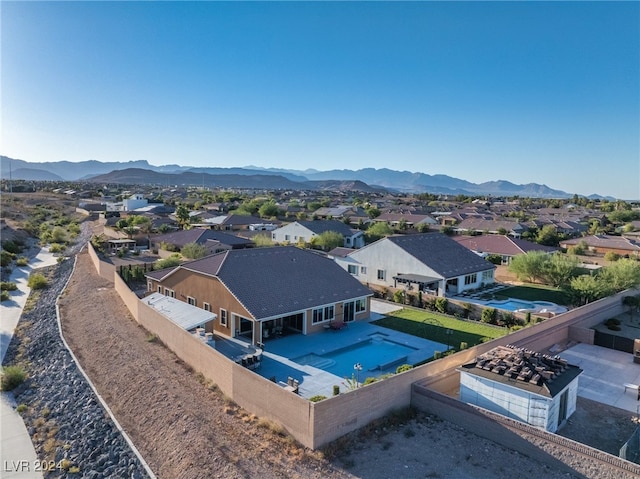 drone / aerial view featuring a mountain view