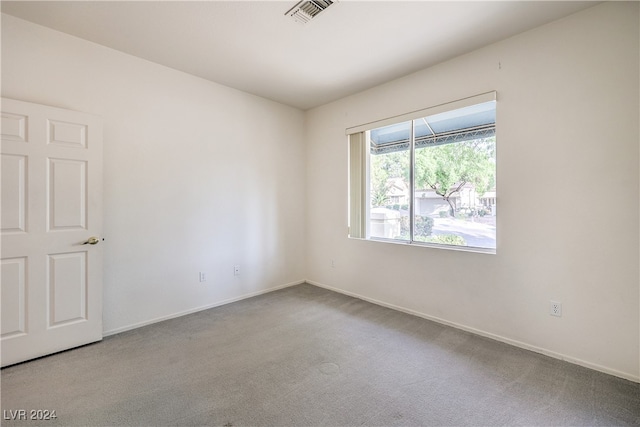 empty room featuring carpet floors