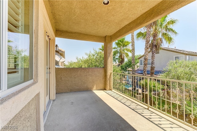 view of patio with a balcony