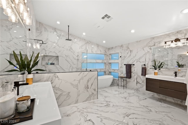 bathroom featuring vanity, tile walls, and shower with separate bathtub