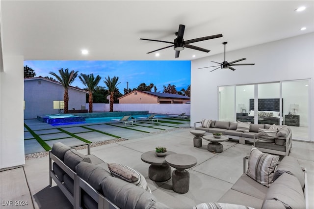 view of patio / terrace with ceiling fan and an outdoor hangout area