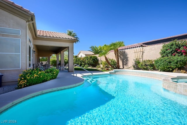 view of pool with a patio