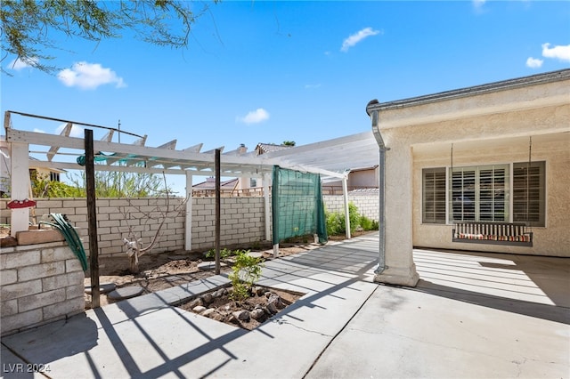 view of patio featuring a pergola