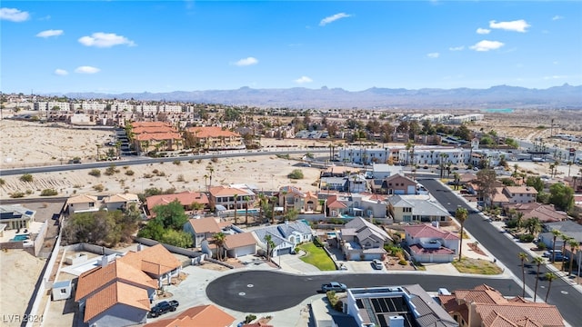 drone / aerial view featuring a mountain view