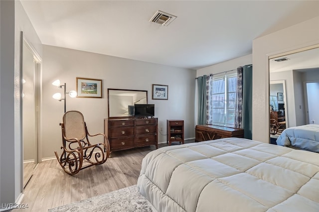 bedroom featuring light wood-type flooring