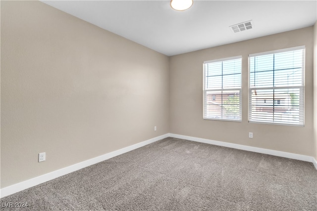 empty room with carpet floors