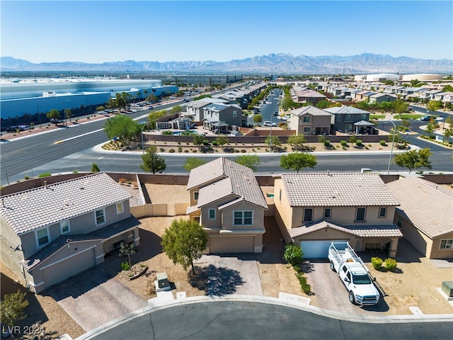 drone / aerial view featuring a mountain view